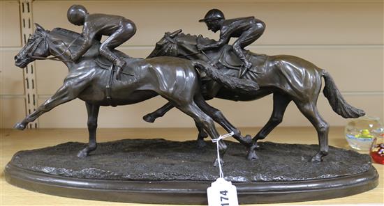 A resin group of two racehorses